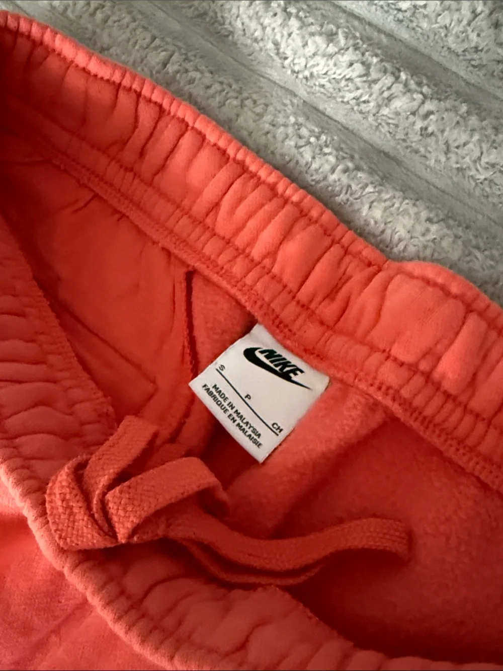 Nike Coral Track Joggers with White Logo